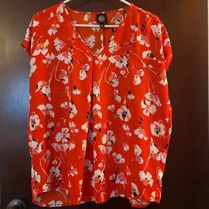 V-neck blouse by Bobeau. Size small. Red with abstract floral pattern